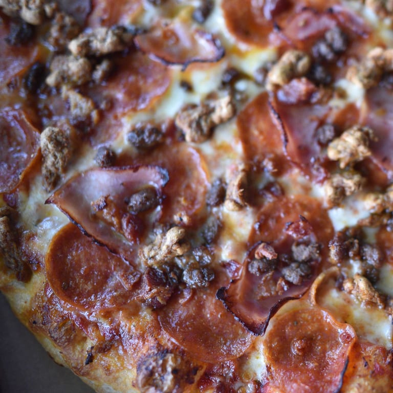 Indulge in Our Meat Pizza